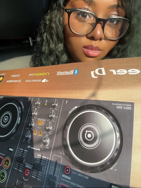 Lana with DJ equipment